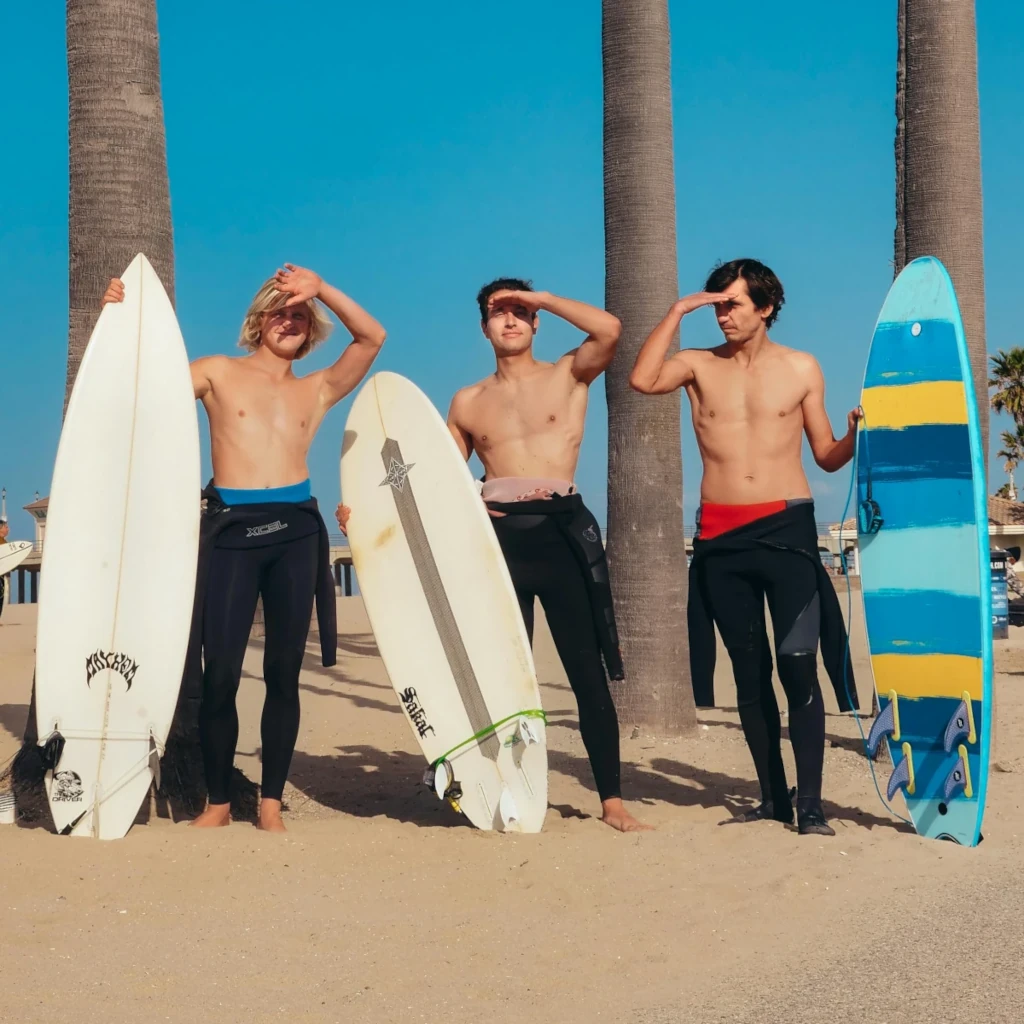 Surf instructor helping a student