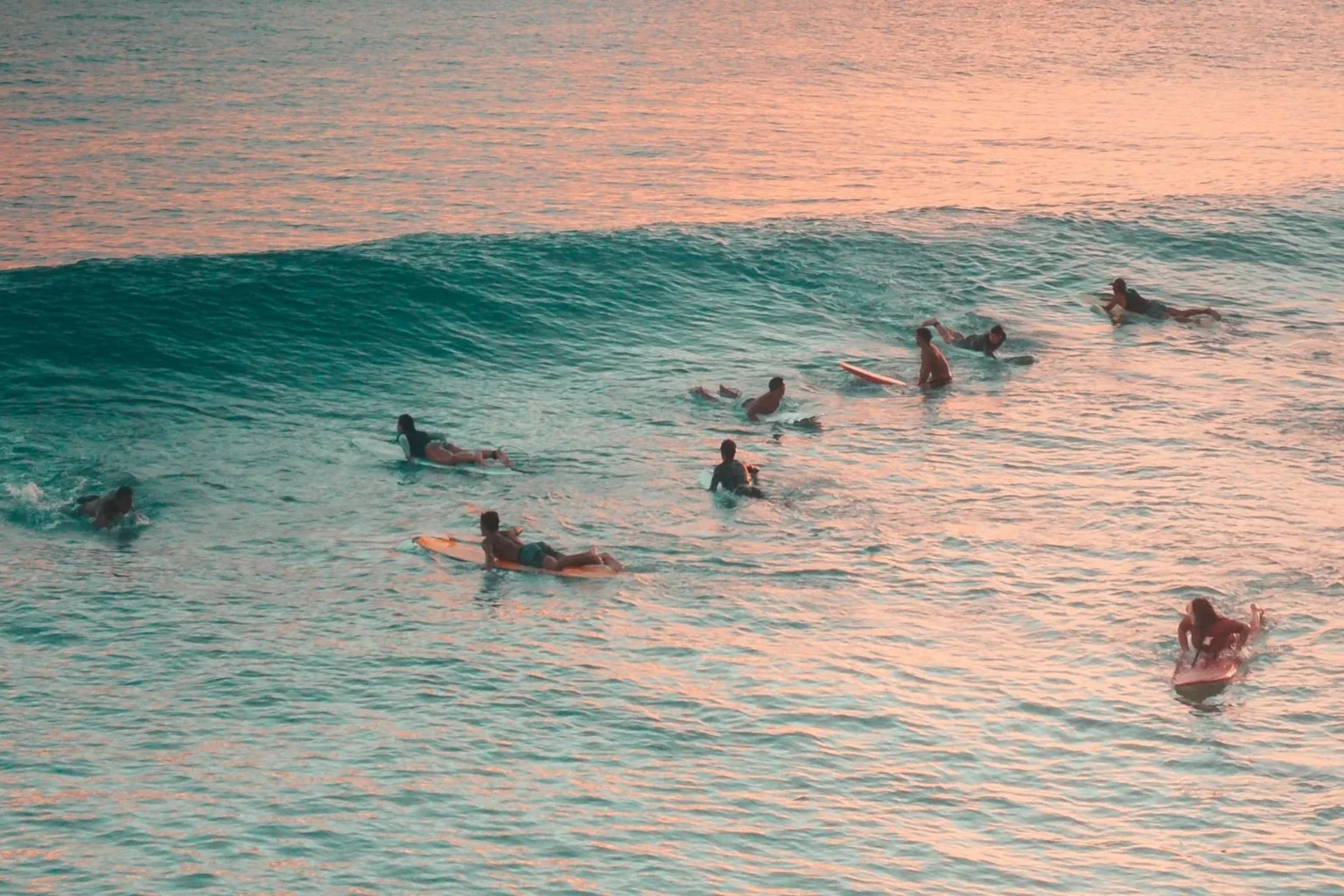 Atlantic Surf Point guests stretching before a sunrise surf session